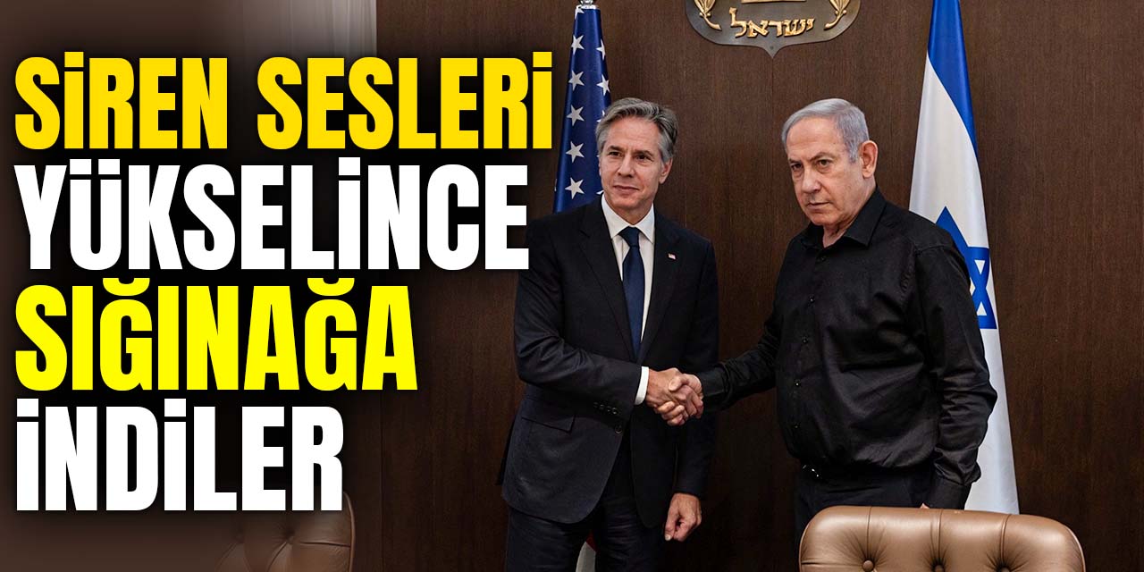 Siren sesleri yükselince görüşmeyi yarıda  bırakıp sığınağa indiler