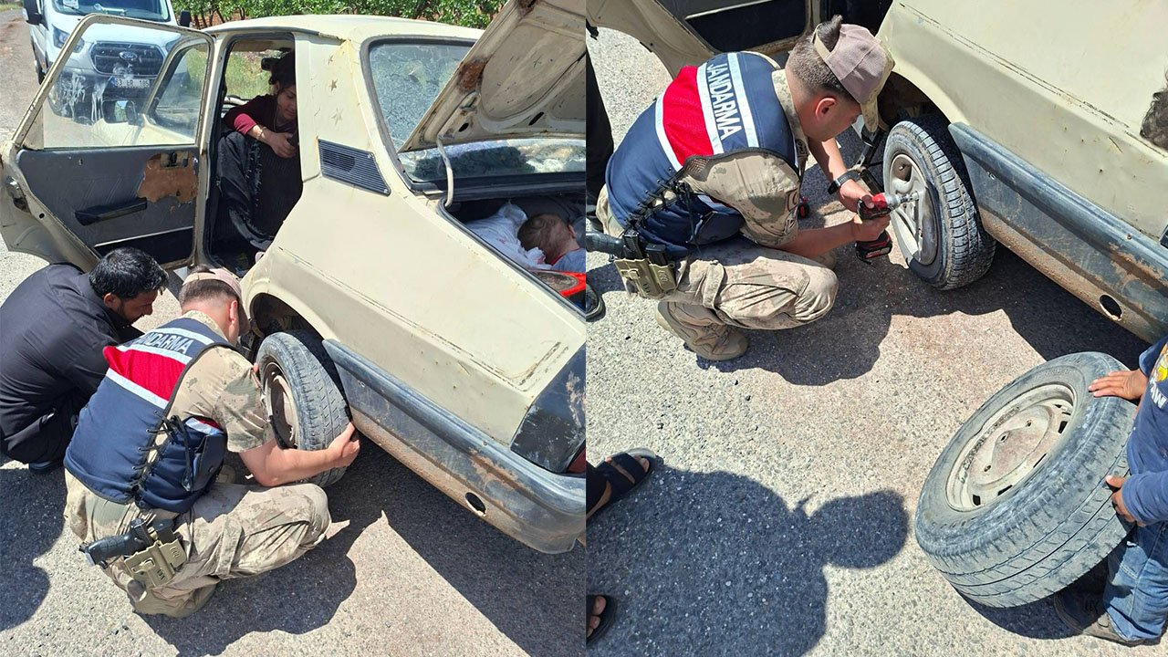 Otomobilin lastiğini jandarma değiştirdi!